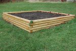 pic of 4x4x8 raised garden bed on a slope.jpg