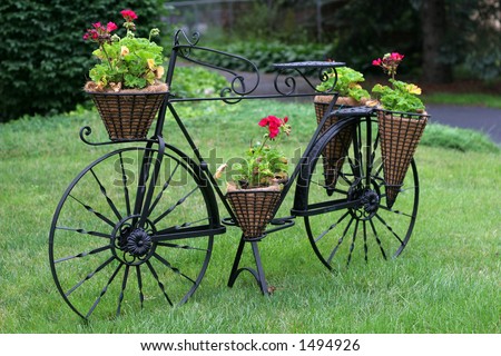 stock-photo-unique-bicycle-planter-with-flowers-1494926.jpg